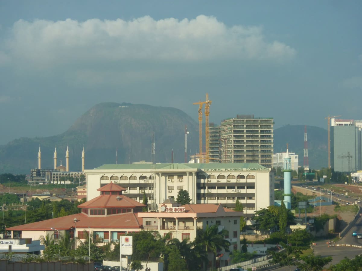 Abuja with Aso Rock behind the city