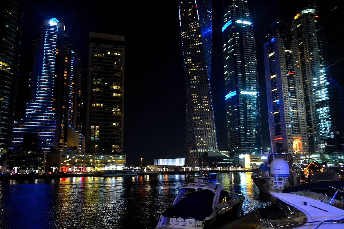 Dubai Marina towers lit up at night